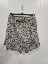 Load image into Gallery viewer, Tan &amp; Black Floral Shorts
